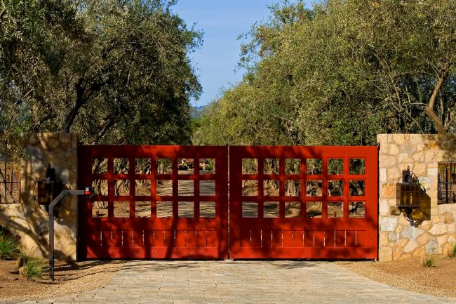 double swing auto security gates protecting access to a rural property