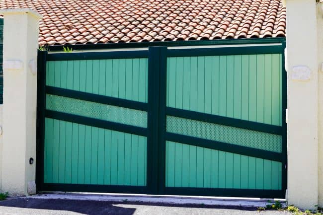 total privacy with wood and steel sliding auto gate
